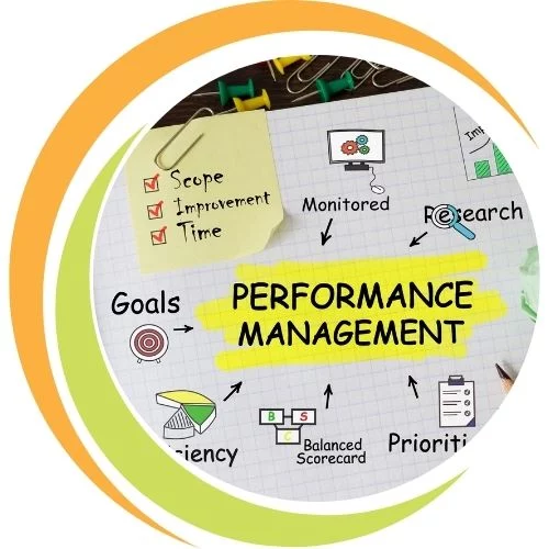 Manager conducting a performance review with an employee, discussing goals, feedback, and metrics to drive professional growth and organisational success.