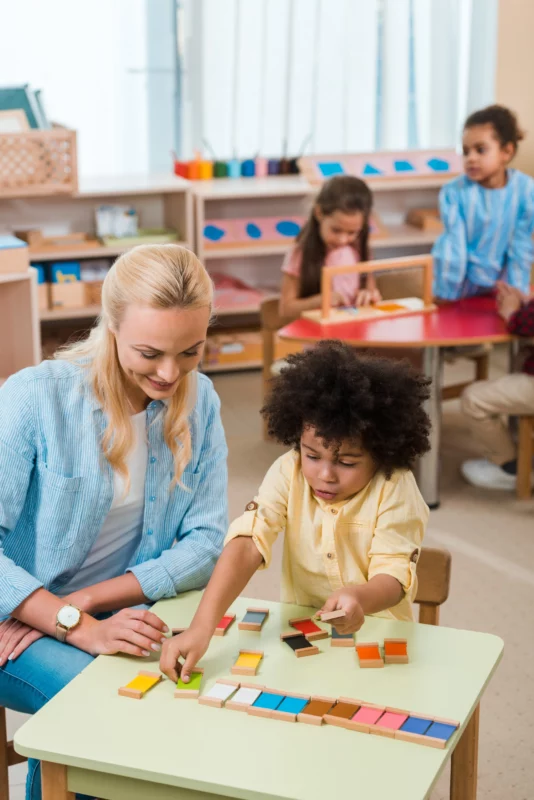 Young child learning with adult teacher in classro 2026 03 12 22 45 35 utc